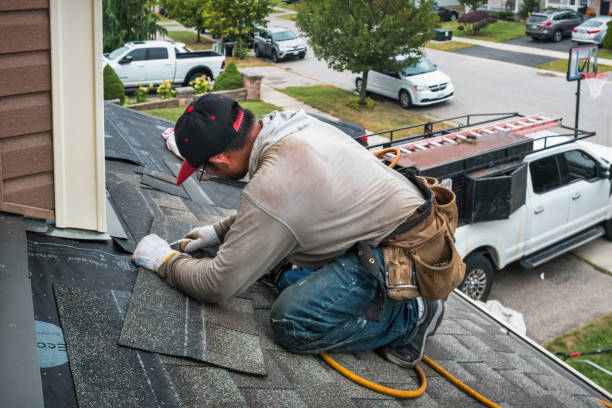 Professional Flat Roof Repair technician working in Four Oaks, NC